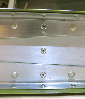 blind rivets set to rear spar