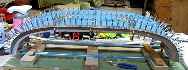 Clecoing Support Flanges To Canopy Assembly