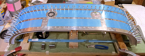 Riveting Canopy Skin To Canopy Frame Assembly