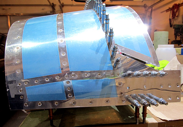 Riveting Canopy Skin To Canopy Assembly
