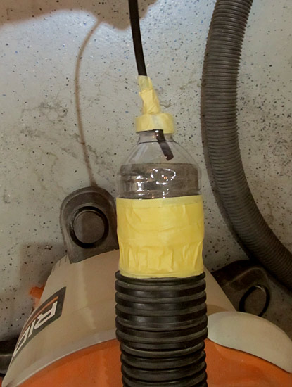 Vacuum Drill Shavings From Elevator
