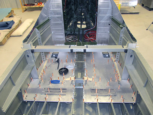 Attaching Baggage Bin Floors To Fuselage