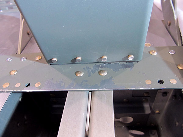 Riveting Flap Motor Channel In Place