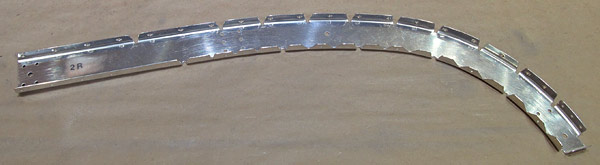 Deburring Edges Of Right Forward Canopy Frame